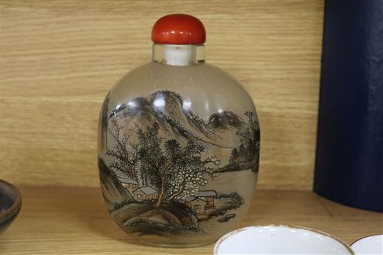 A collection of mixed Oriental ceramics and snuff bottles
